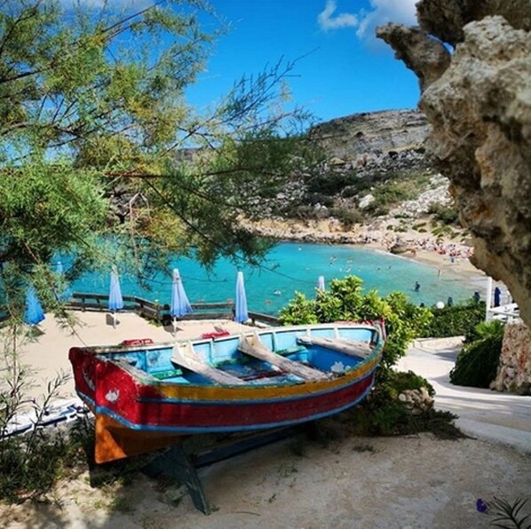 Beach nearby, sun loungers