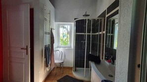 Shower, hair dryer, towels, soap