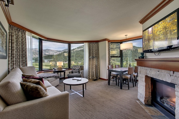 Xtra Large Grand Living room with 6 picturesque view windows. Cozy fireplace!