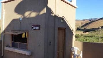 Economy Double Room, 1 Bedroom, Shared Bathroom, River View | Shared kitchen | Full-sized fridge, microwave, cookware/dishes/utensils