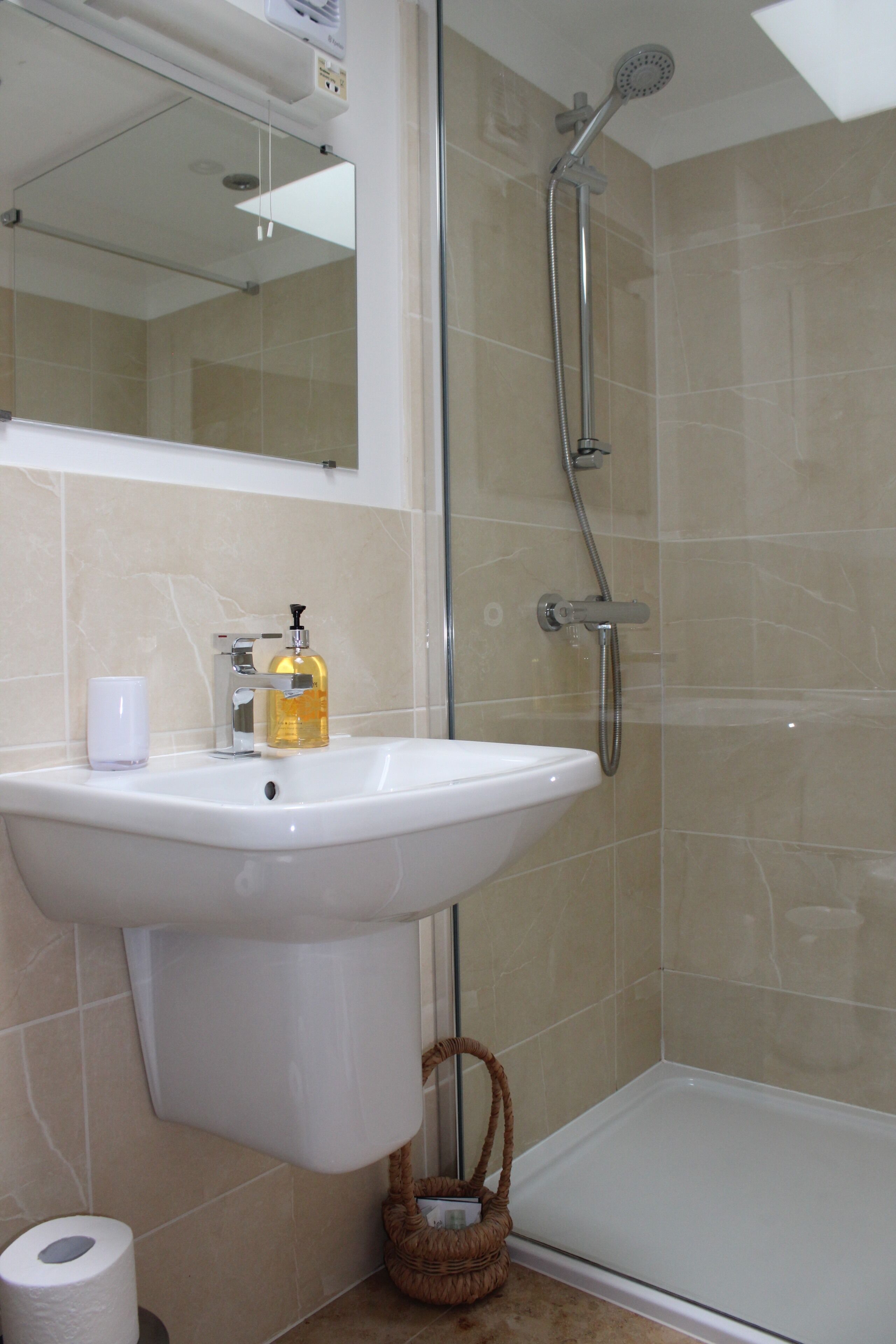 Shower, hair dryer, towels, soap