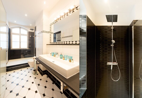 Bathtub, hair dryer, towels, soap
