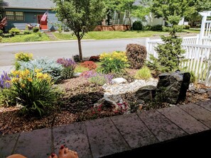 View from front porch to street & water fountain
