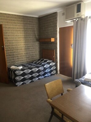 Family Room | Iron/ironing board, free WiFi, bed sheets