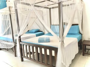 Deluxe Triple Room, Multiple Beds, Garden View, Garden Area | Premium bedding, minibar, individually decorated, bed sheets - Seashore Mirissa (Mirissa)