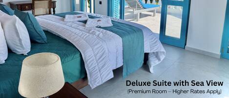Studio Suite Deluxe, 1 giường cỡ king, máy điều hòa, quang cảnh biển | Bộ trải giường bằng vải cotton Ai Cập, bộ đồ giường cao cấp, minibar