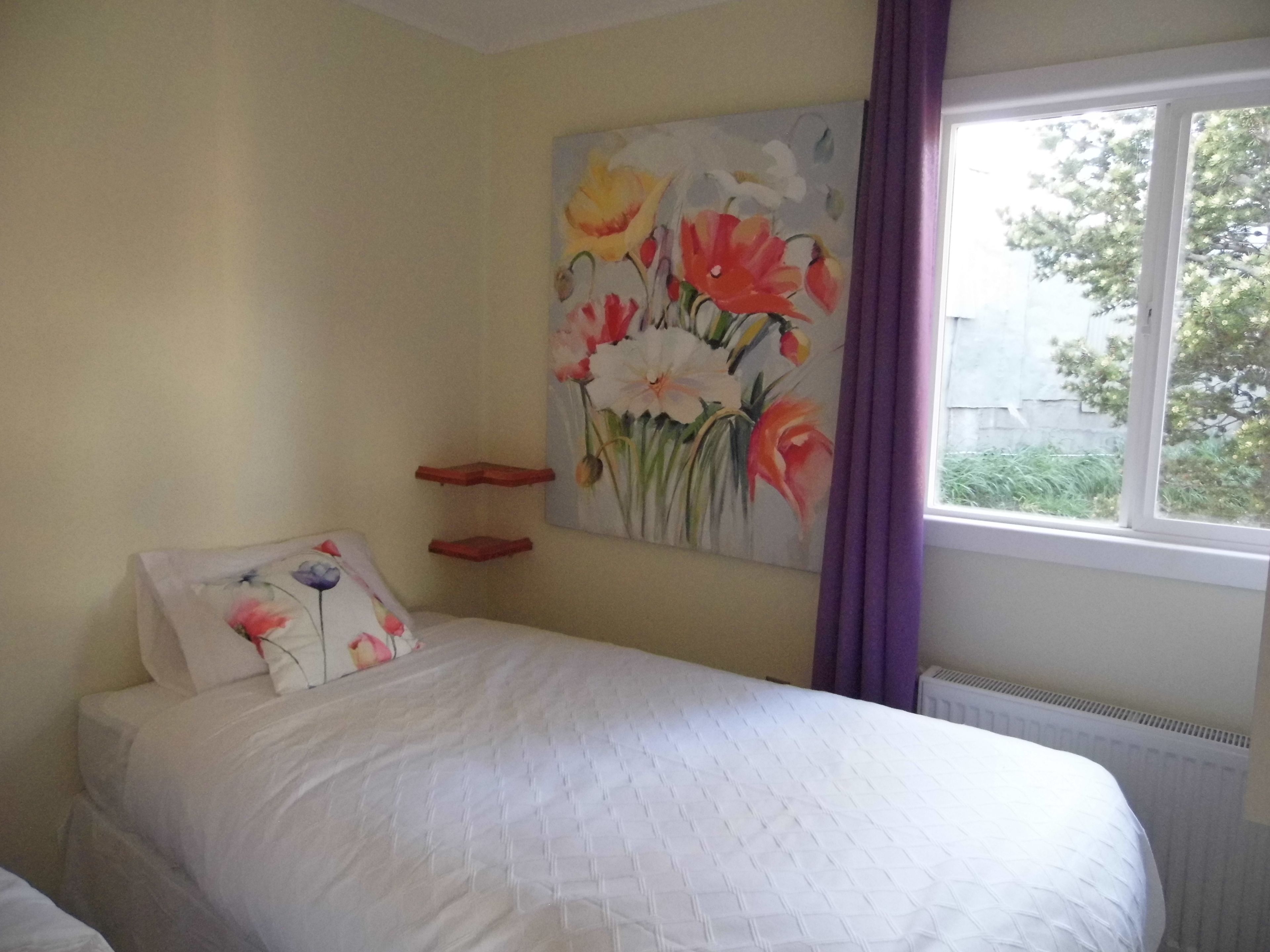2 bedrooms, premium bedding, down comforters, individually decorated