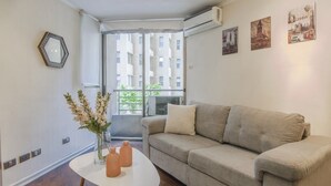 Apartment, 1 Double Bed with Sofa bed, Non Smoking | Living room | Flat-screen TV - Alojarent Huérfanos (Santiago)