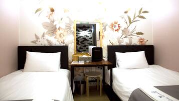 Ylelliset vuodevaatteet, kannettavalle tietokoneelle sopiva työtila