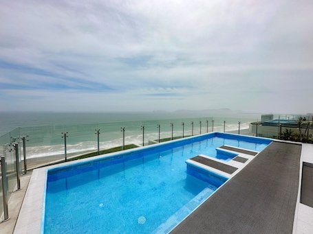 Exclusive Apartment, 3 Bedrooms, Ocean View | 3 bedrooms, desk, laptop workspace, iron/ironing board