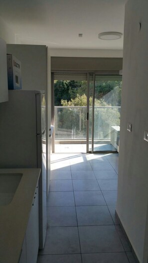 Apartment, 1 Schlafzimmer | Eigene Küche | Großer Kühlschrank, Mikrowelle, Herdplatte, Wasserkocher