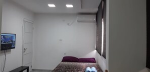 Apartment, 1 Bedroom | Living area | Flat-screen TV
