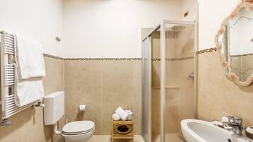 Shower, rainfall showerhead, free toiletries, hair dryer