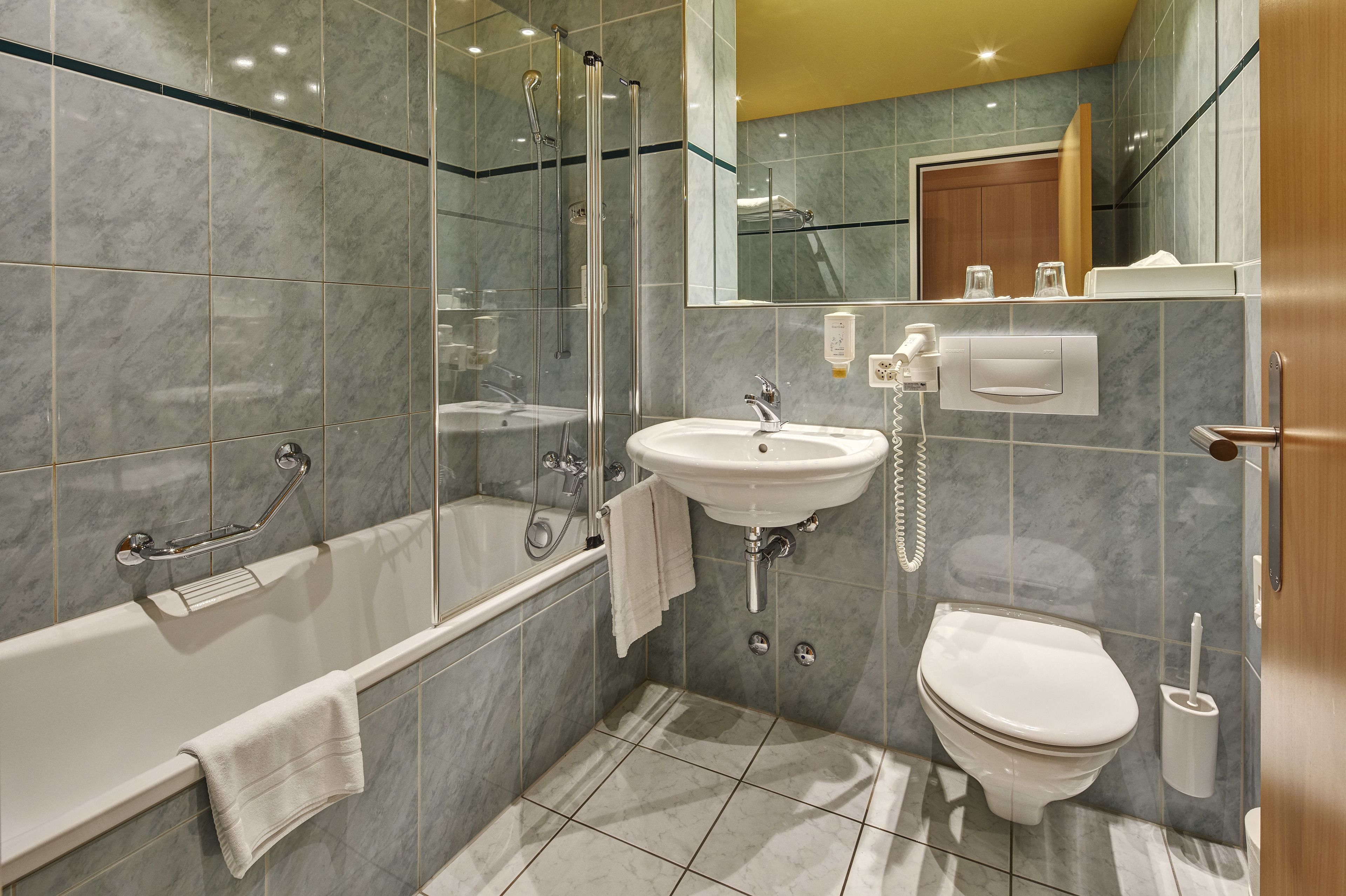 hair dryer, towels, soap, shampoo