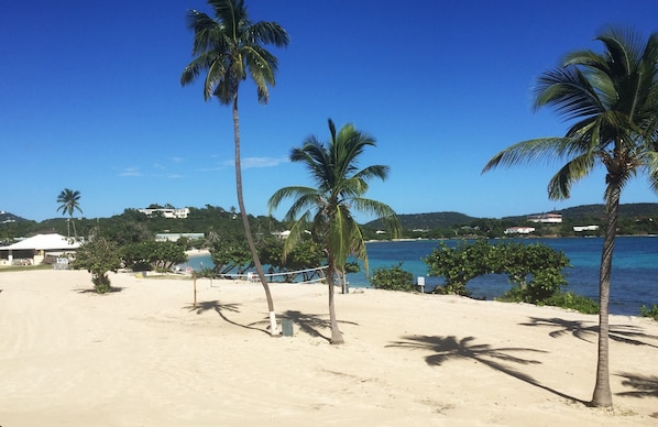 On the beach, sun loungers, beach towels
