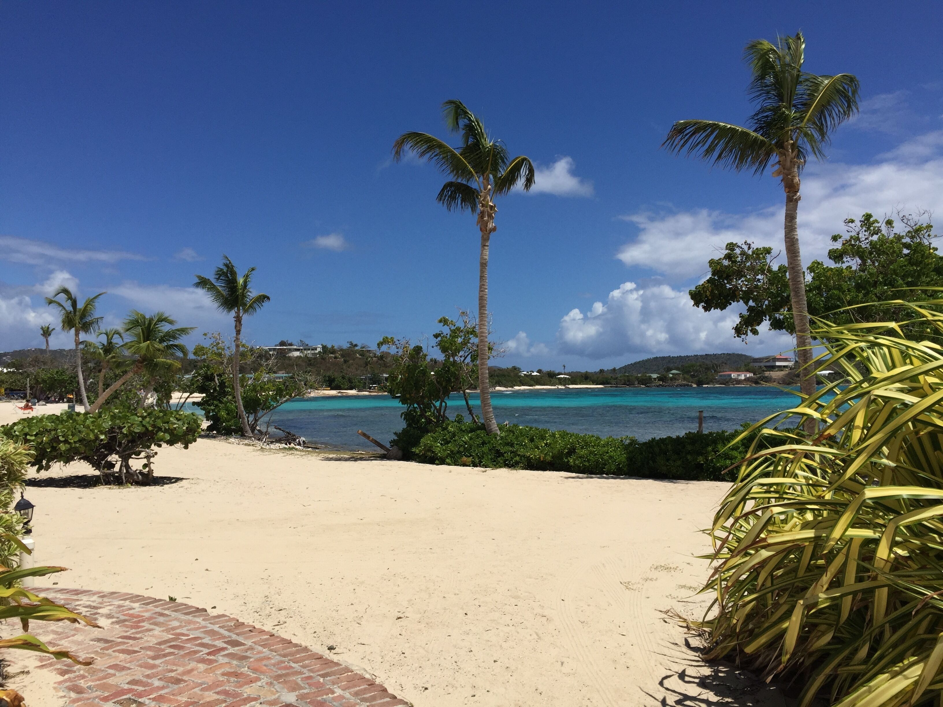 On the beach, sun loungers, beach towels