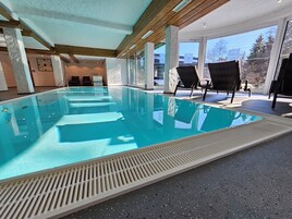 Indoor pool, open 8:00 AM to 8:00 PM, pool umbrellas, sun loungers