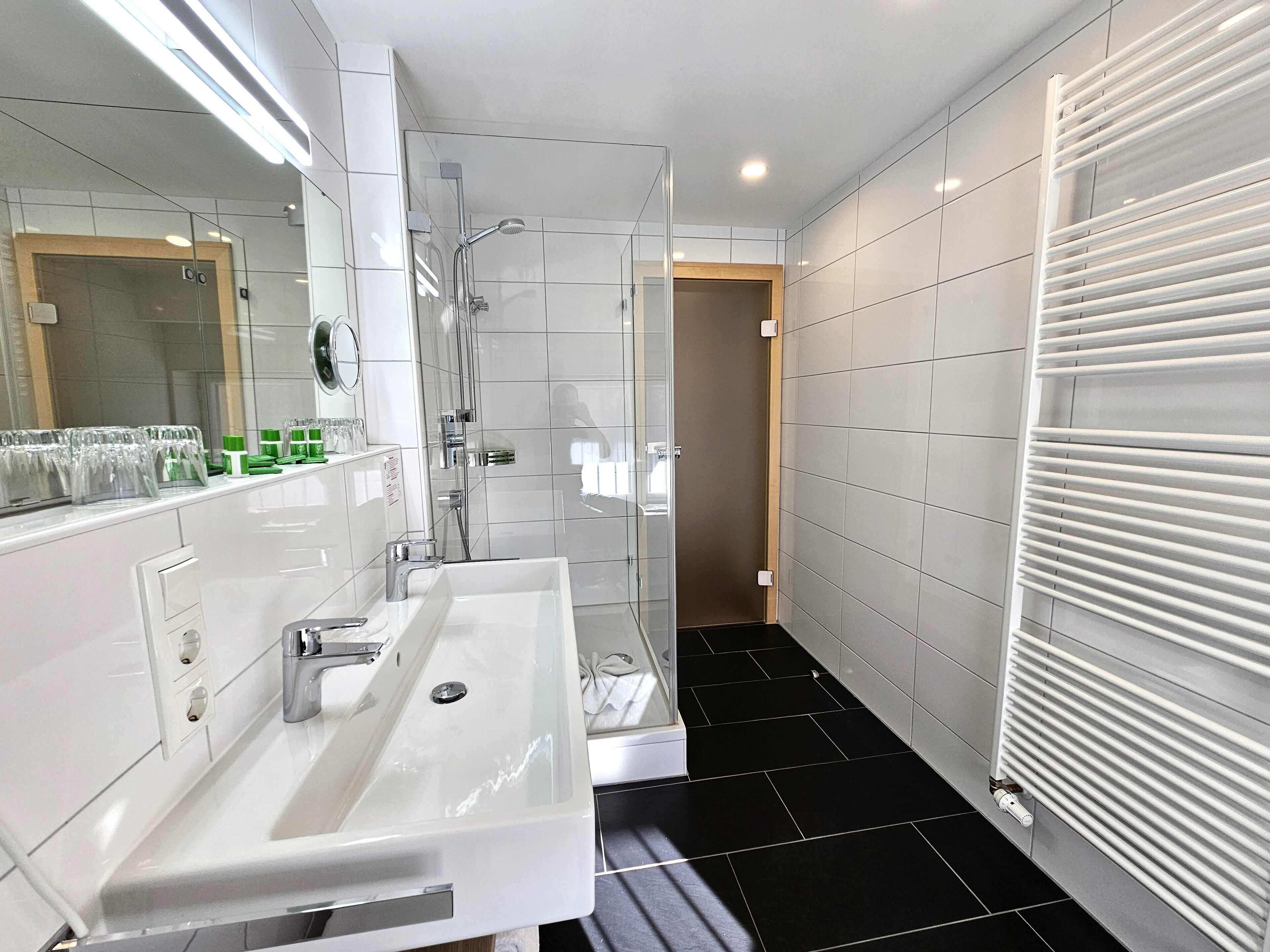 shower, hair dryer, bathrobes, slippers