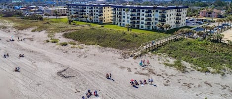 On the beach, sun loungers, beach umbrellas, beach towels