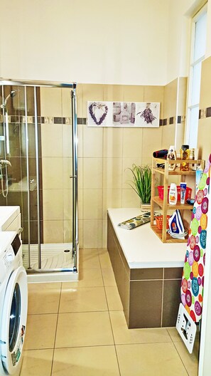 Shower, hair dryer, towels, soap