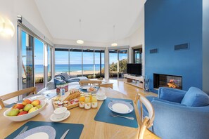 Panoramic Villa, 2 Bedrooms, Sea View | Living area | Smart TV, fireplace, DVD player - Chocolate Gannets (Apollo Bay)