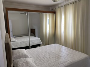Habitación cuádruple Elite | 1 dormitorio, escritorio, wifi gratis y ropa de cama