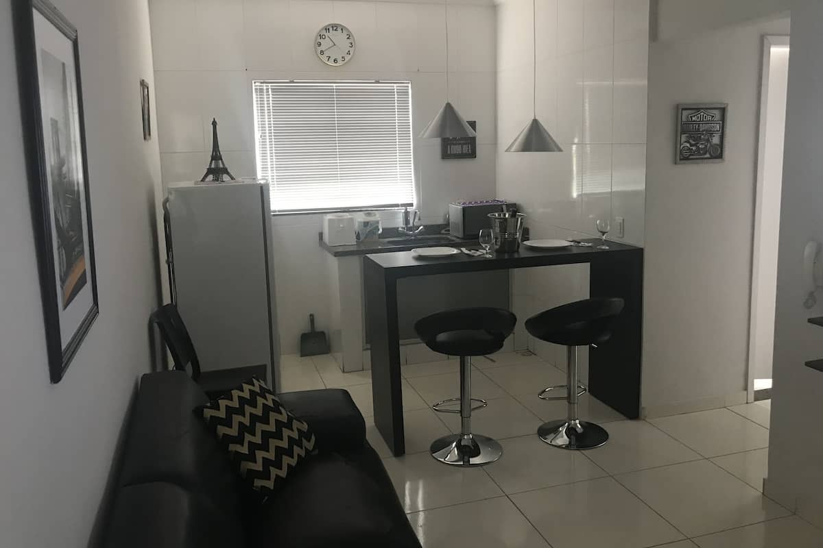 Basic Apartment, Multiple Beds | Living area | LCD TV