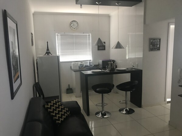 Basic Apartment, Multiple Beds | Living area | LCD TV