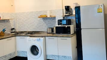 Fridge, microwave, stovetop, coffee/tea maker