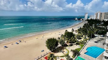 On the beach, sun loungers, beach towels