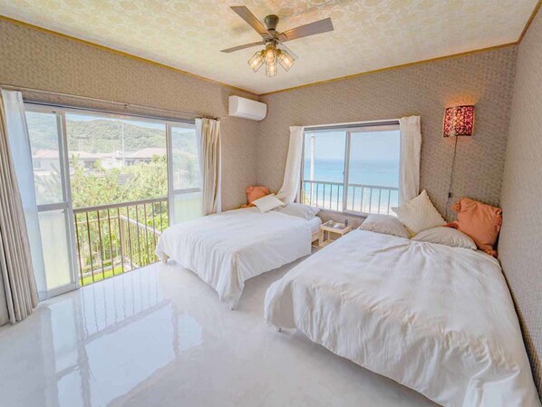 Suite with Ocean View | Individually decorated, blackout drapes, bed sheets - Vacation House Familia (Kozushima-mura)