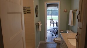Combined shower/bathtub, hair dryer, towels, soap