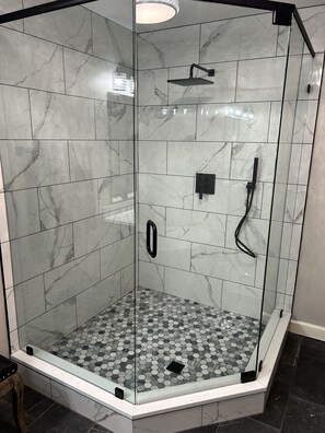 Bathtub, jetted bath, hair dryer, towels