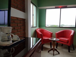 Junior Double Room Single Use, 1 King Bed, Non Smoking, Courtyard View | Living room | TV, Netflix