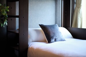 Blackout curtains, free WiFi, bed sheets