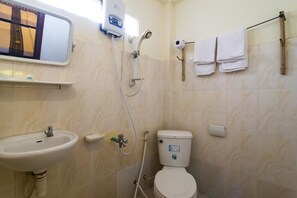 Shower, free toiletries, slippers, towels