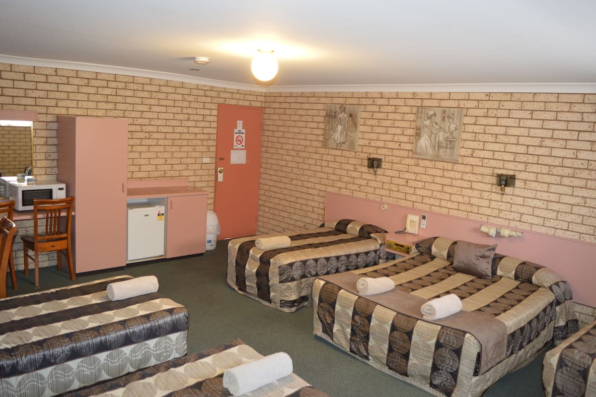 Superior Quadruple Room (1 queen and 4 single beds) | Blackout drapes, soundproofing, iron/ironing board (on request)