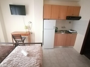 Frigorífic, forn i placa de cuina