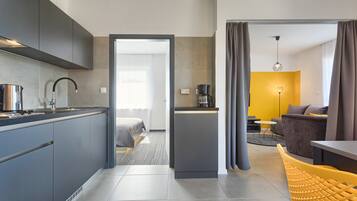 Apartment, 1 Bedroom, Garden View | Living area | Flat-screen TV