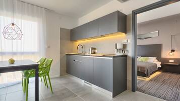 Apartment, 1 Bedroom, Sea View | Private kitchen | Fridge, microwave, stovetop, coffee/tea maker