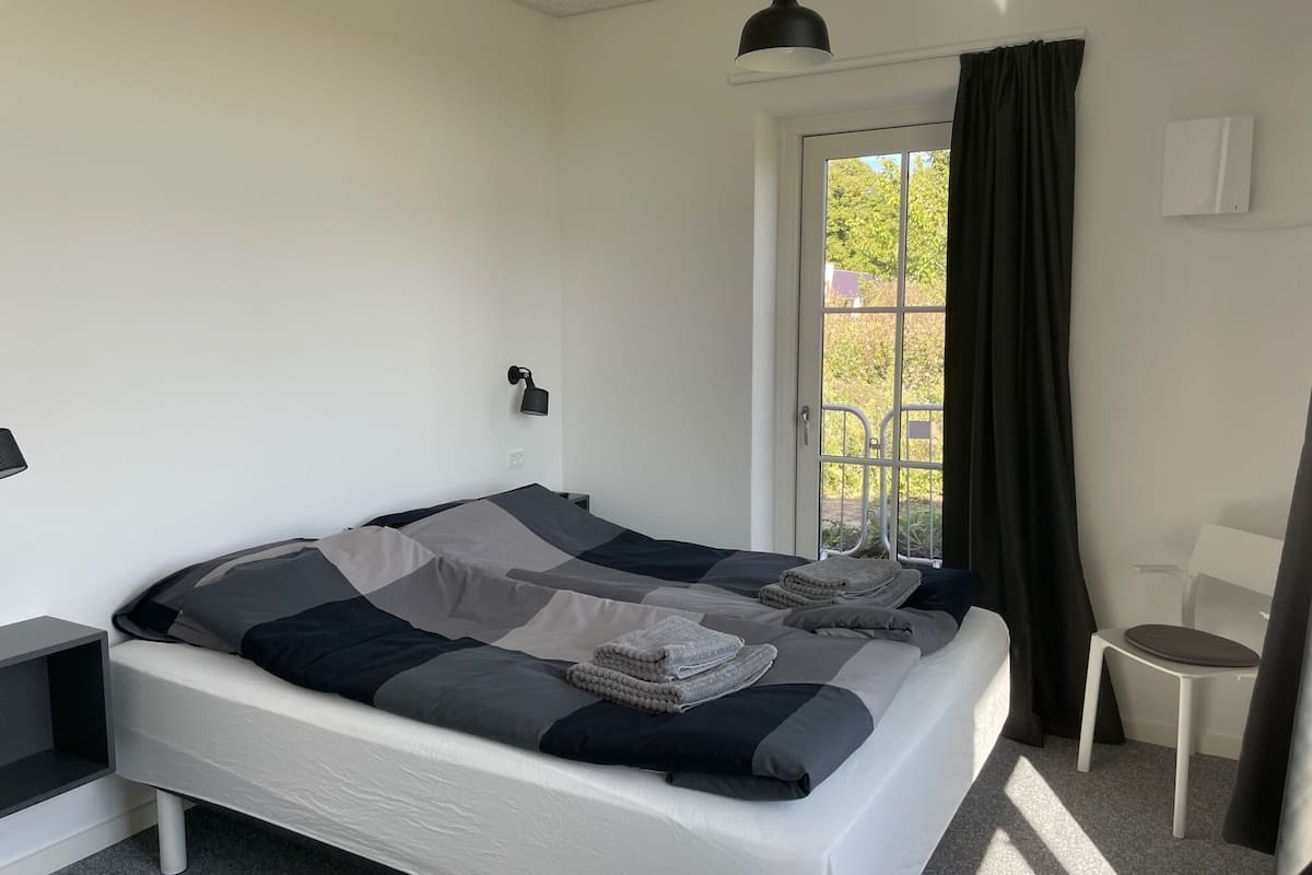 standard apartment (34) | premium bedding, desk, blackout curtains, soundproofing