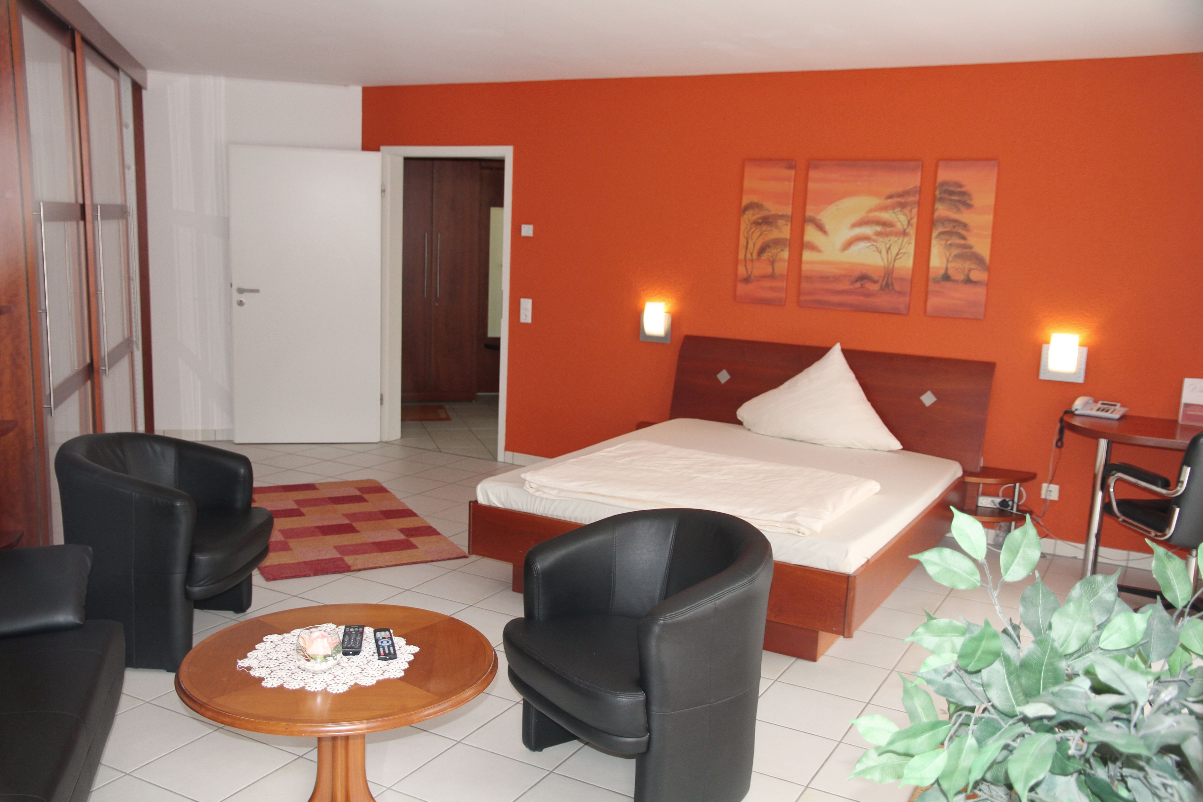 junior suite | in-room safe, desk, laptop workspace, blackout curtains