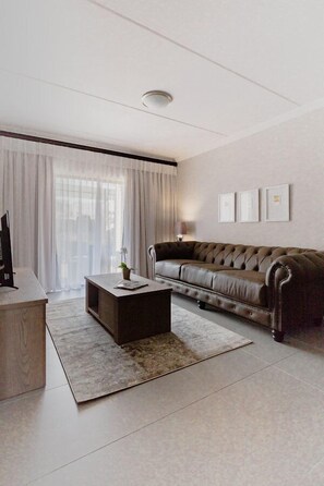 Luxury Apartment | Living room | Smart TV, Netflix - Kyalami Creek Luxury Apartments (Midrand)