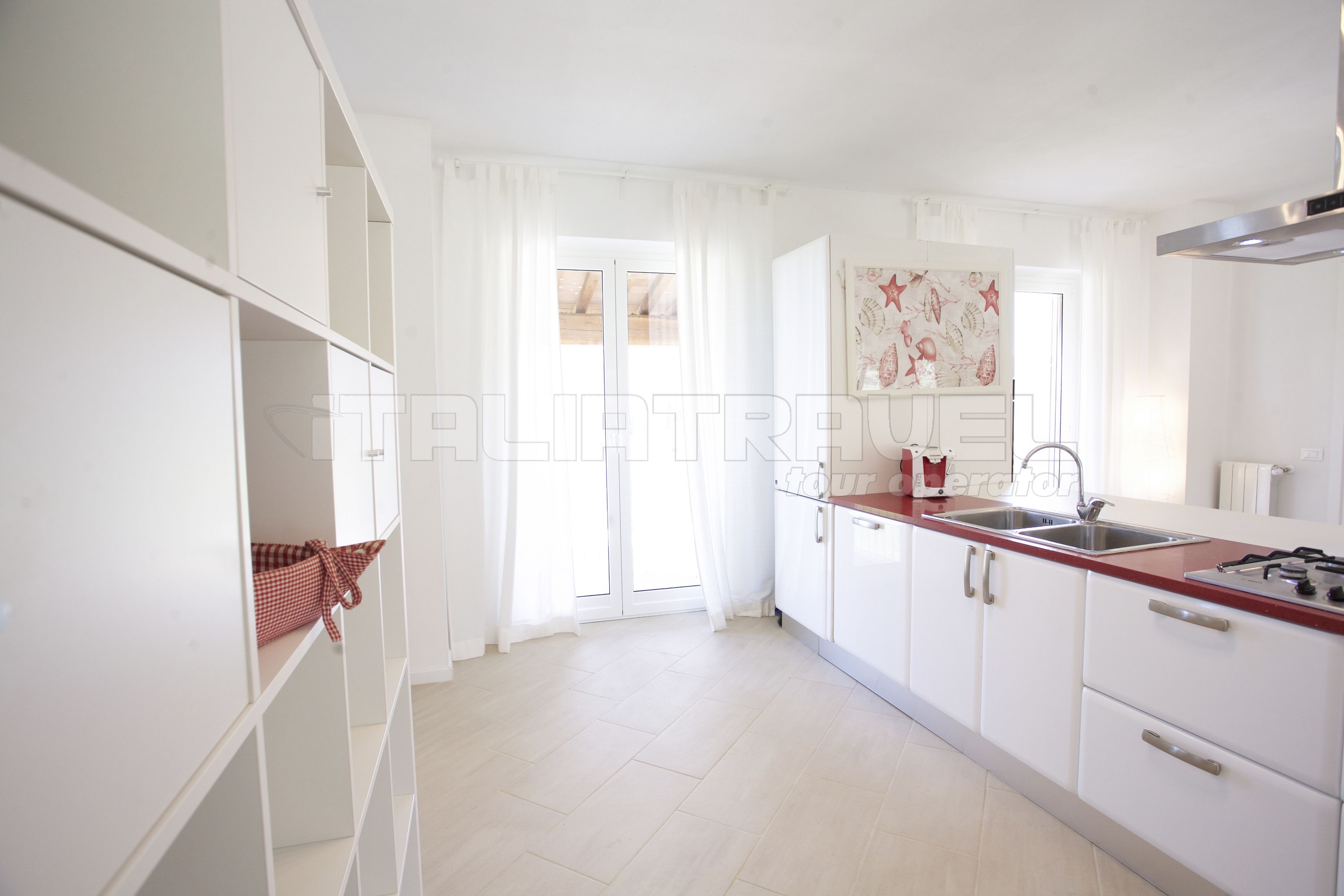 Apartamento, 4 quartos | Cozinha privada | Geladeira, fogão, cooktop, lava-louças