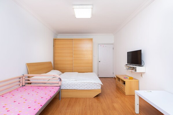 Habitación familiar | Área de sala de estar | Televisión de 42 pulgadas con canales por cable