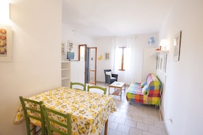 Apartment, 2 Bedrooms (no.2) | Living room | TV - Appartamenti Arco Bianco (Capoliveri)