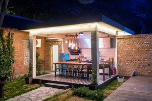 Casa de diseño, 4 habitaciones | Cocina privada | Frigorífico, microondas, placa de cocina y hervidor eléctrico