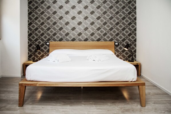 Premium bedding, minibar, desk, soundproofing