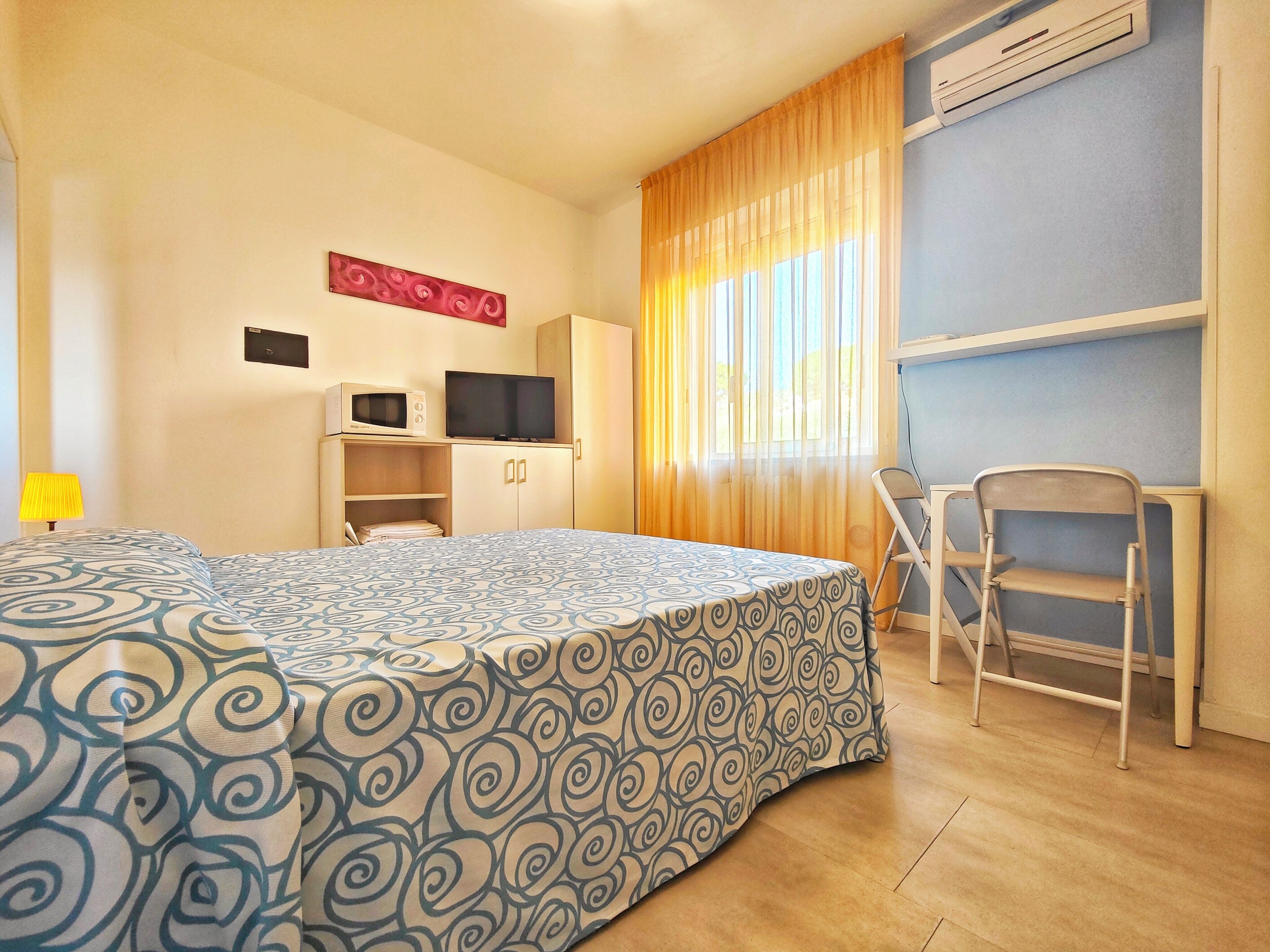 Basic Room (A1) | Premium bedding, in-room safe, blackout drapes, iron/ironing board