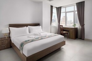 Habitación Deluxe, 1 cama de matrimonio grande | Ropa de cama de alta calidad, colchones con acolchado adicional, minibar